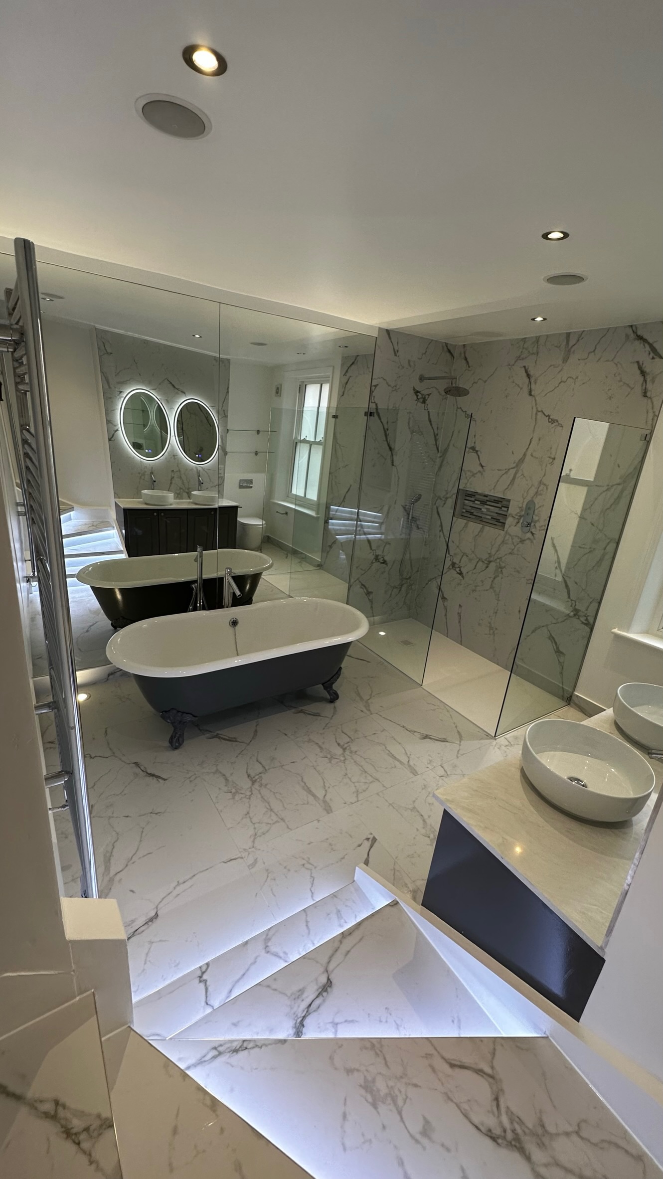 Luxury marble bathroom refurbishment by Loyalty Construction